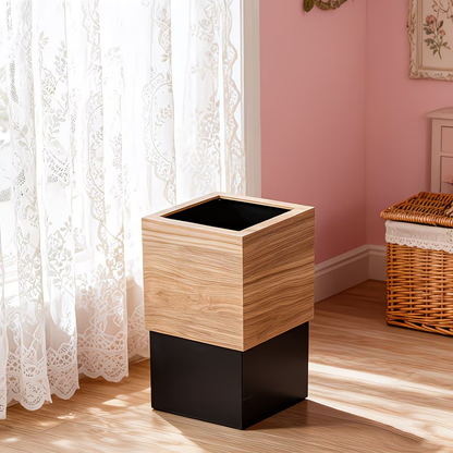 A modern square trash can with a black lid and a Scandinavian design.