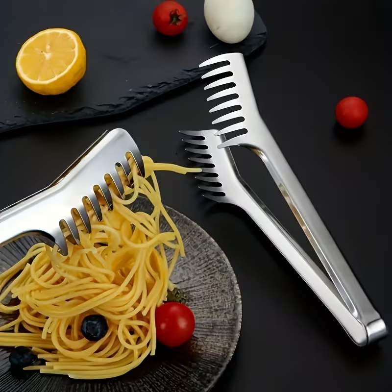Stainless steel pasta tongs, suitable for buffets and family meals.