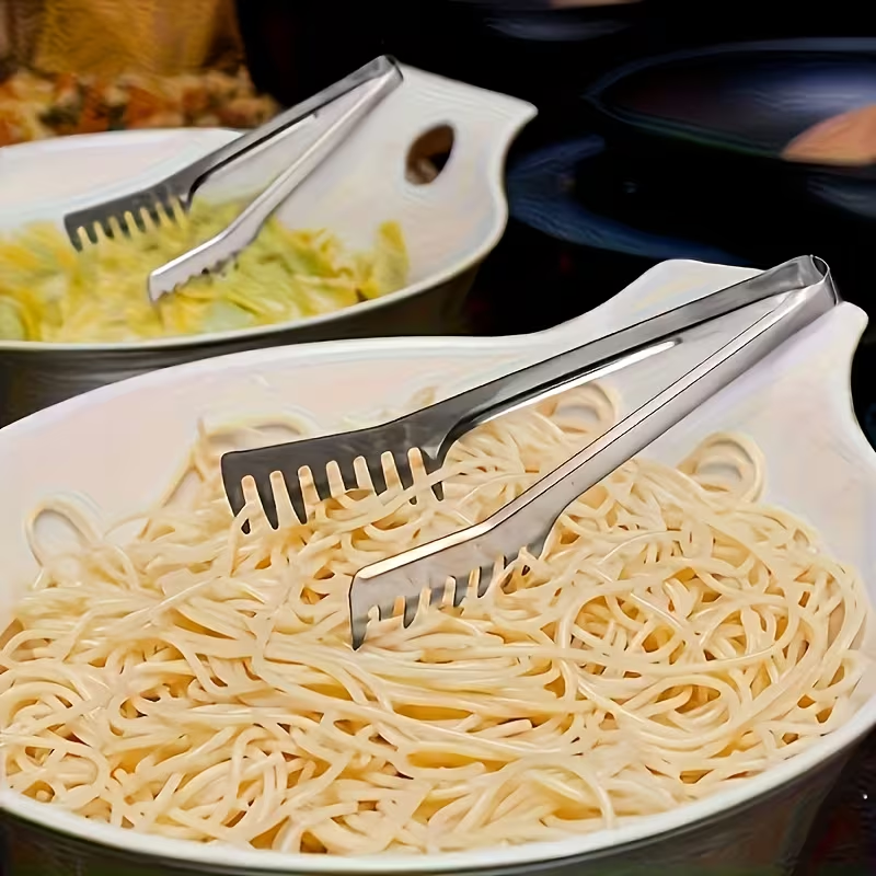 Stainless steel pasta tongs, suitable for buffets and family meals.