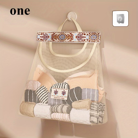 One wall-mounted fabric storage bag with hanging net and hooks.